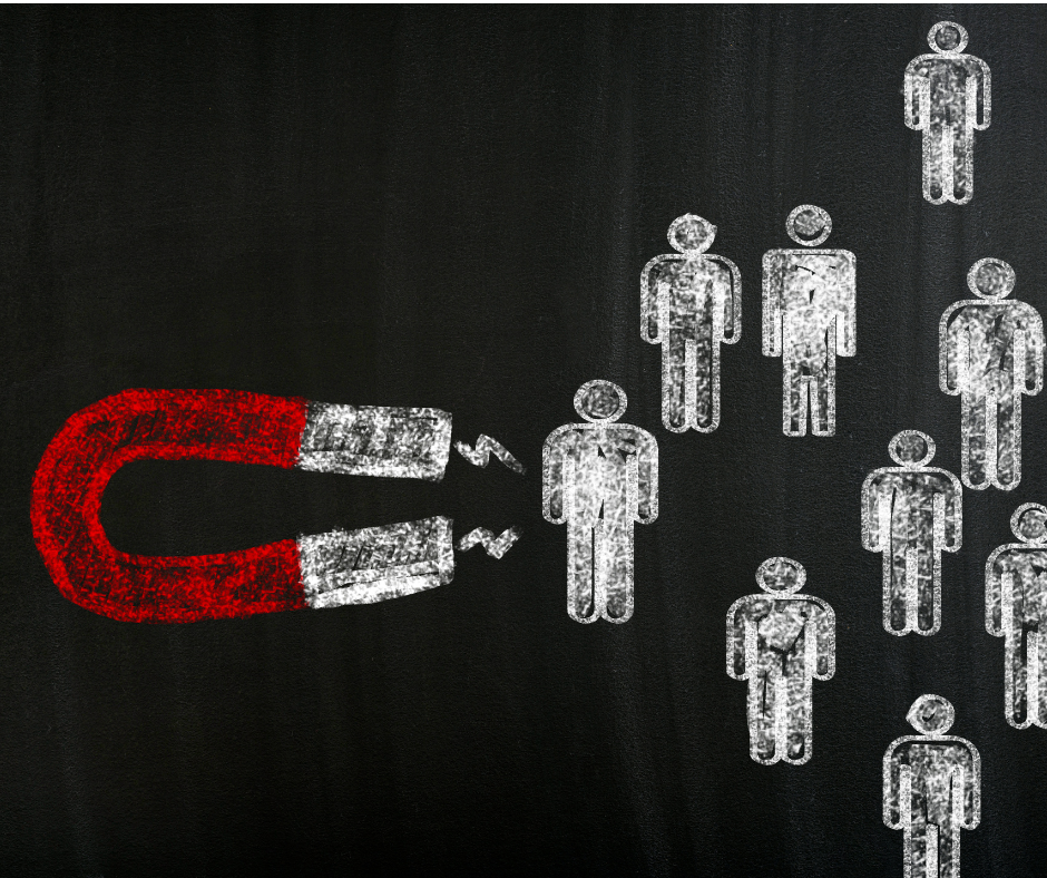 imã puxando pessoas